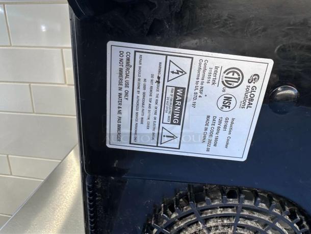 Global Solutions GS1561 Commercial Induction Cooker label; 1800W, NSF Certified, for commercial use, made in China.
