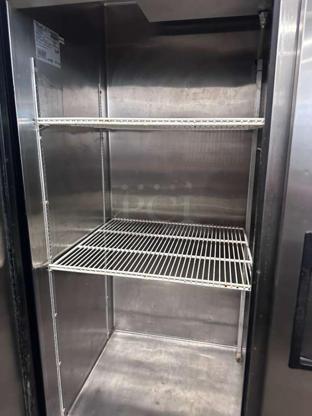 True TS-49 commercial two-door reach-in refrigerator, exceptional condition, NSF & UL listed, stainless steel shelves.