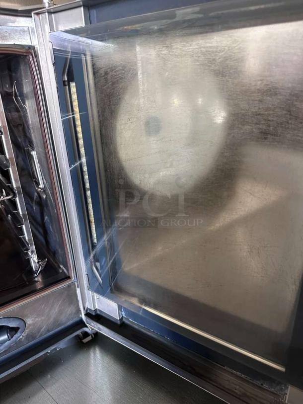 Rational SelfCookingCenter commercial combi oven, 6-pan capacity, digital controls, stainless steel interior, fully operational.