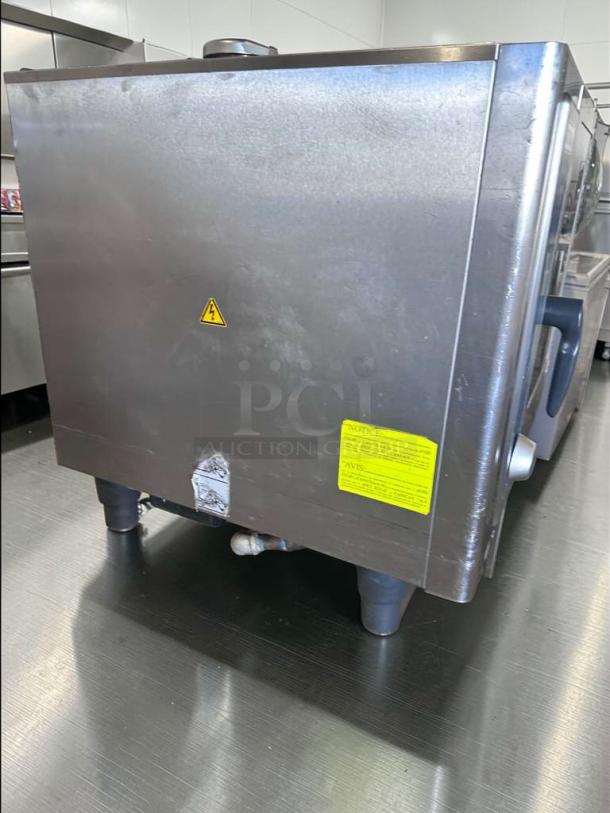 Elite Condition Rational SelfCookingCenter combi oven, 6-pan capacity, digital controls. Fully tested. Model RAT-L-OVN-0704.