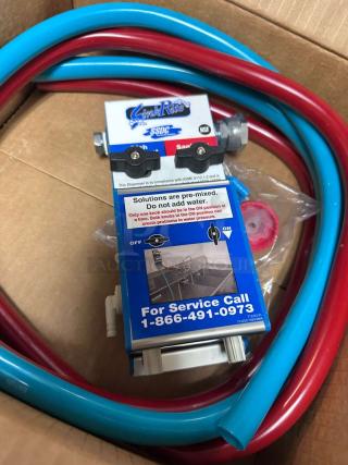 Brand new SinkRite SSDC 3-Compartment Sink Dispenser with red and blue hoses, NSF certified, pre-mix instructions visible.