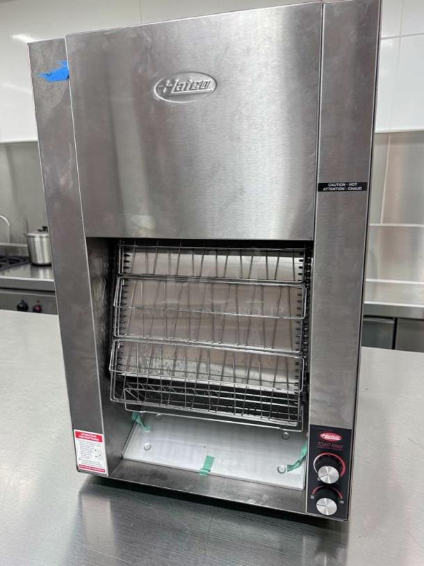 Brand new Hatco Toast-King TK-100 commercial vertical conveyor toaster, 1 1/4" capacity, stainless steel, 240V, NSF & UL listed.