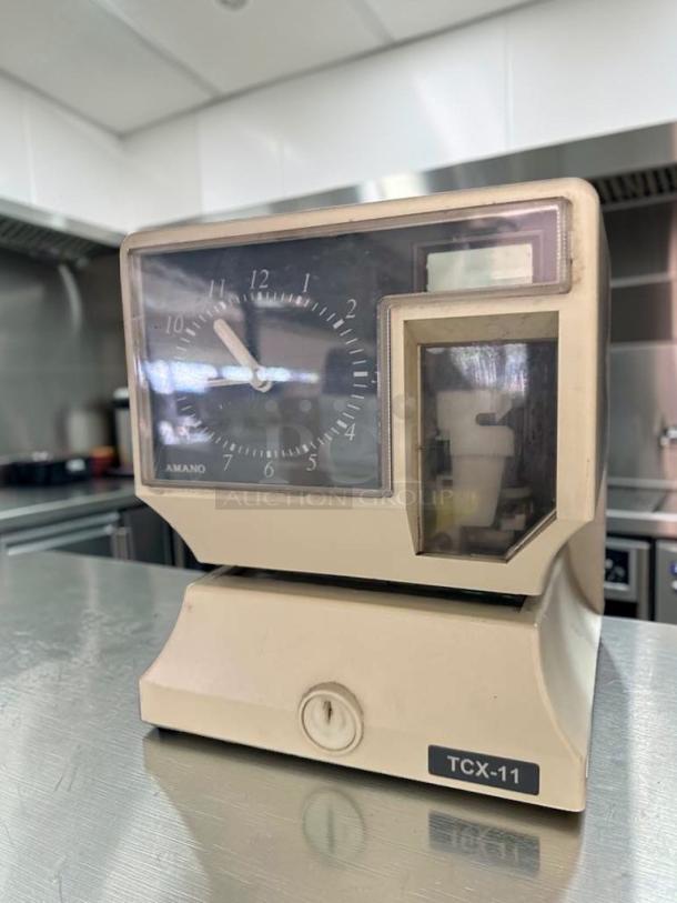 Elite condition Amano TCX-11 time recorder clock; analog, UL listed, fully tested, operational, by Amano Cincinnati, Inc.