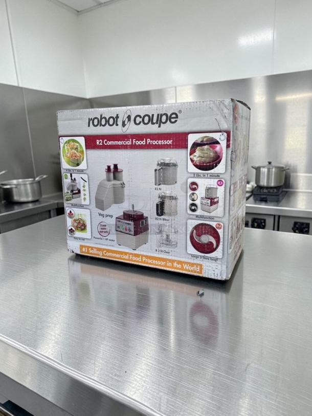 Brand new Robot Coupe R2 food processor in sealed box, 2.9 qt bowl, vegetable prep attachment, NSF & UL listed.
