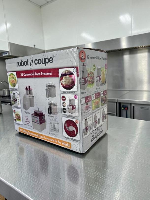 Brand new Robot Coupe R2 commercial food processor in box, 2.9 Qt bowl, vegetable prep attachment, NSF & UL listed.