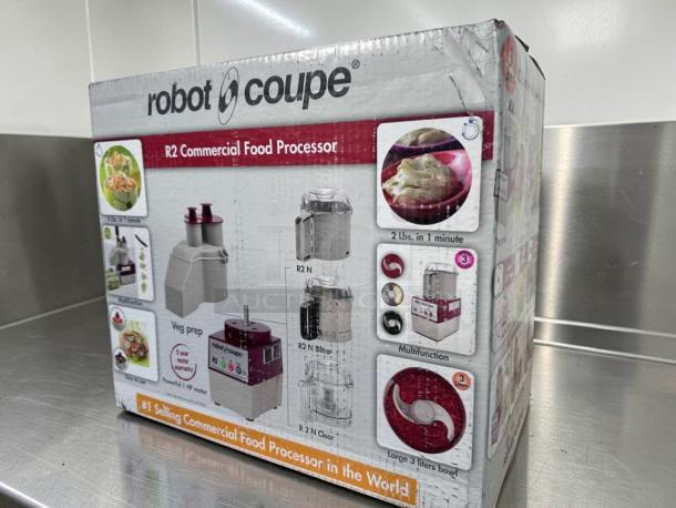 Brand new Robot Coupe R2 commercial food processor in box, 2.9 Qt bowl, vegetable prep attachment, NSF & UL listed.