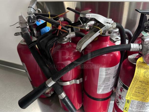 Lot of 9 Commercial 5 lb ABC Fire Extinguishers, 2A:10B:C rating, prime condition, UL listed, suitable for restaurant use.