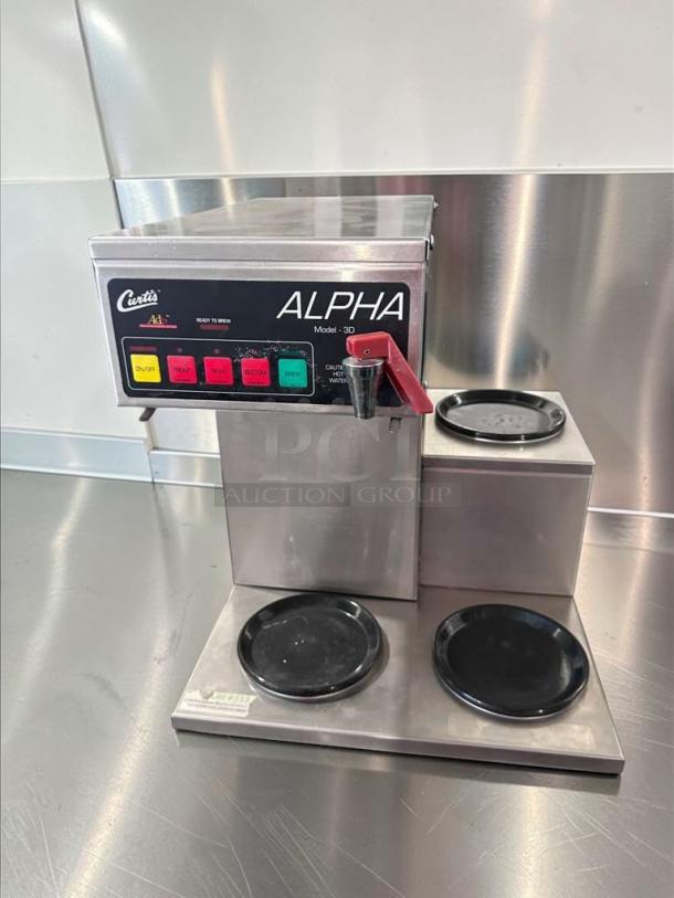 Wilbur Curtis Alpha 3DR-12 coffee brewer, dual warmer plates, in outstanding condition. Features model 3D, UL listed, fully tested.