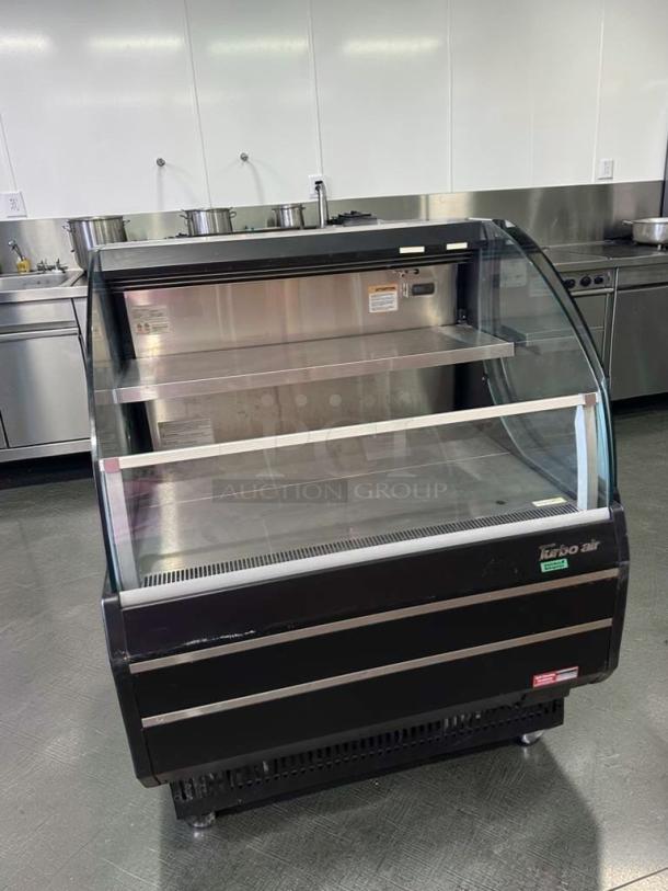 Turbo Air TOM-40LB-N 39" open air cooler, 2-level display, black finish, 115V, tested, excellent condition. Model label visible.