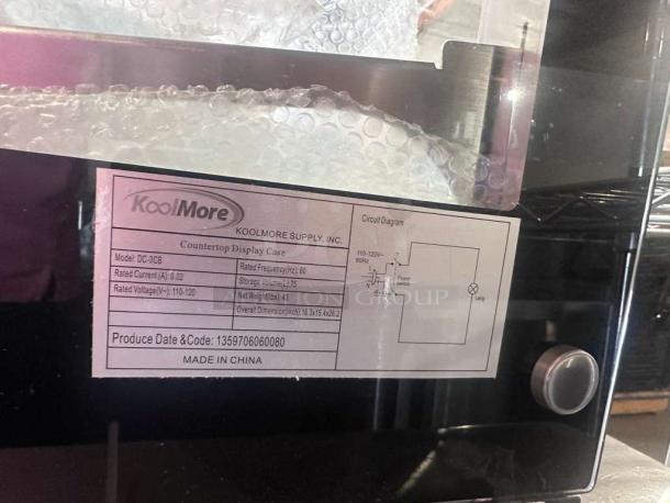 KoolMore DC-3CB Countertop Glass Bakery Display Case label showing model, voltage, and dimensions.