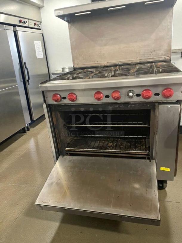 American Range commercial gas range with 6 burners and oven, model AMR-L-RNG-0097, fully tested, premium condition.