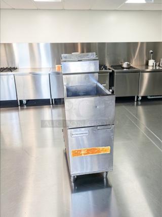 Frymaster Commercial Gas Fryer, stainless steel, floor model, heavy-duty, fully operational, visible branding and wear marks.