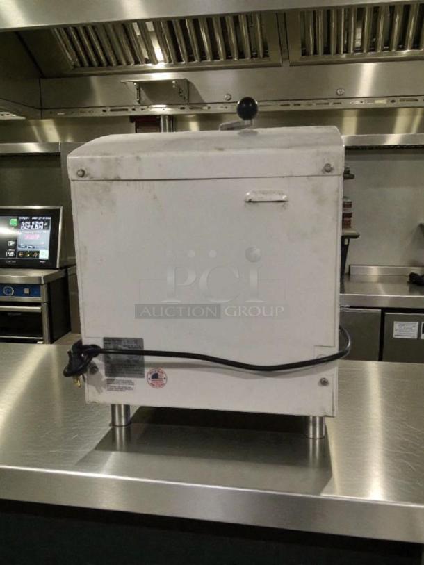 DoughXpress D-TXE-2-18 dough press in pristine condition, 208–240V, single phase, tested, with visible label and plug.
