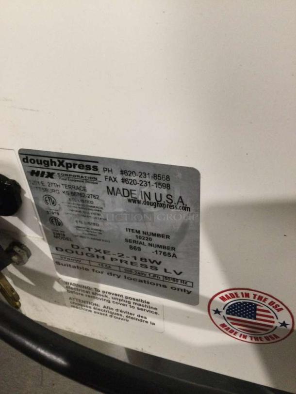 DoughXpress D-TXE-2-18 commercial dough press label showing model, voltage, and "Made in USA" marking in immaculate condition.