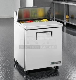 True TSSU-27-08-HC sandwich prep table in exceptional condition, stainless steel, visible True logo, tested and working.