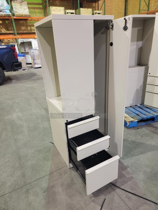 Lot of 3 Herman Miller Meridian storage towers with wardrobe, three lateral drawers, and shelving; steel, chalk finish.