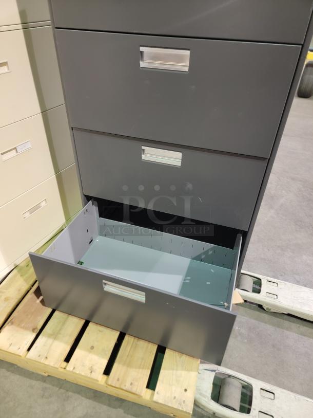 Two Hon 4-drawer lateral file cabinets, reinforced steel, ball-bearing slides, letter/legal size, no keys, excellent condition.