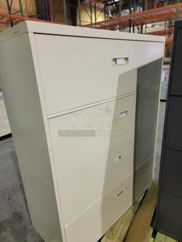 Lot of 2 Hon 4-drawer lateral file cabinets, reinforced steel, ball-bearing slides, accommodates letter/legal files, no keys.