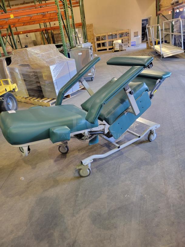 Medtek Custom Comfort hydraulic utility chair with steel frame, industrial vinyl, and adjustable features for versatile use.