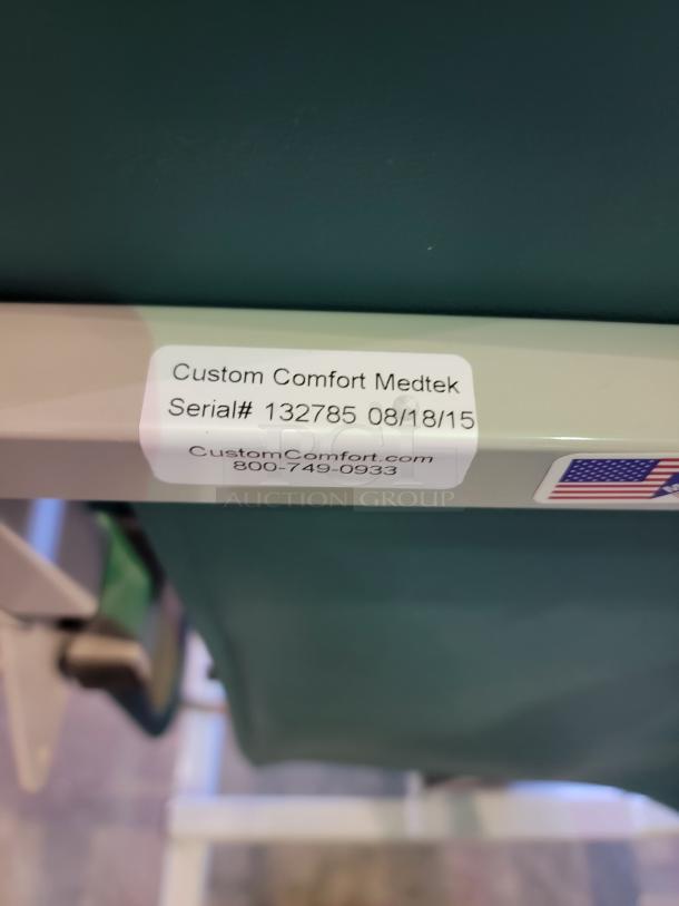 Medtek Custom Comfort hydraulic chair with reinforced steel frame, industrial vinyl, adjustable height, and pivoting arms. Serial# 132785.