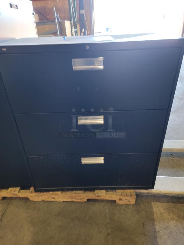 Lot of 3 HON black lateral file cabinets with reinforced steel, ball-bearing glides, and safety interlock; two with keys.