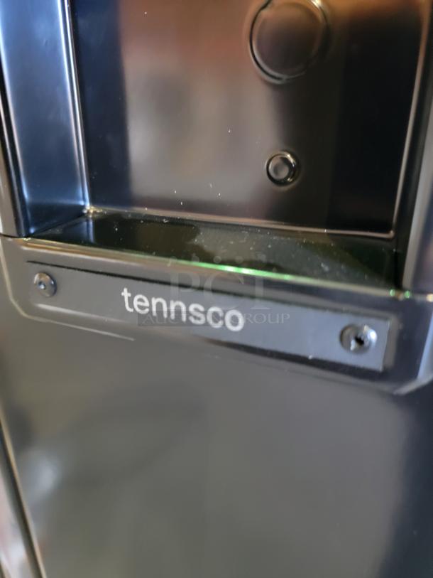 Tennsco double-tier locker in black, featuring steel construction with recessed handles and integrated louvers.