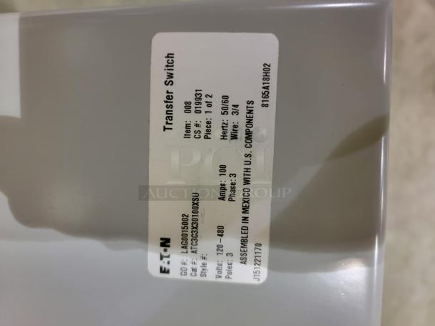 Eaton ATC-300 Transfer Switch, new, with label showing specs: 100 Amps, 3-phase, 50/60Hz, 3/4 wire, assembled in Mexico.