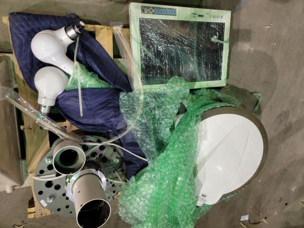 STERIS Harmony LED Surgical Lighting System, ceiling mount, with 2 LED light heads, components wrapped for protection.