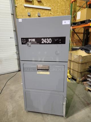 Fox Compactors 2430 industrial waste compactor, gray, steel frame, dual dial controls, pull bin, Model 2430, Serial No. 10107.