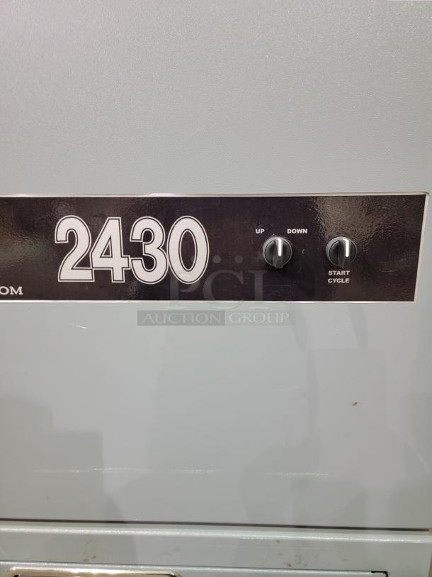 Fox Compactors 2430 industrial waste compactor with dual-dial control interface, serial no. 10107, robust steel frame.