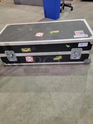 PENN-ELCOM 4' road case, black laminate, aluminum edges, steel corners, foam interior, swivel casters, handles, butterfly latches.