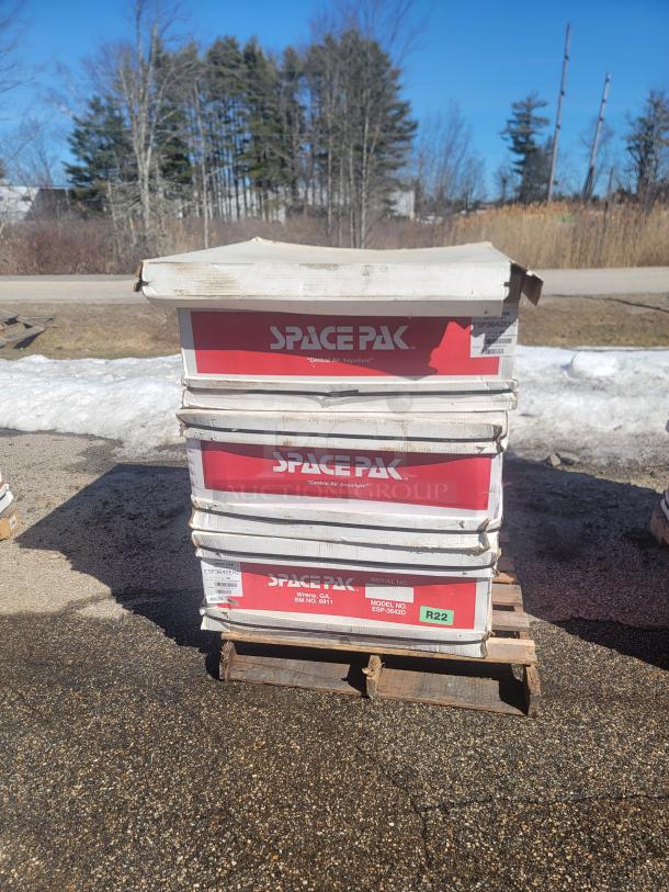 New in box SpacePak HVAC units on pallet, featuring high-velocity components. Includes fan coil units and air handlers, Model ESP-3642D.