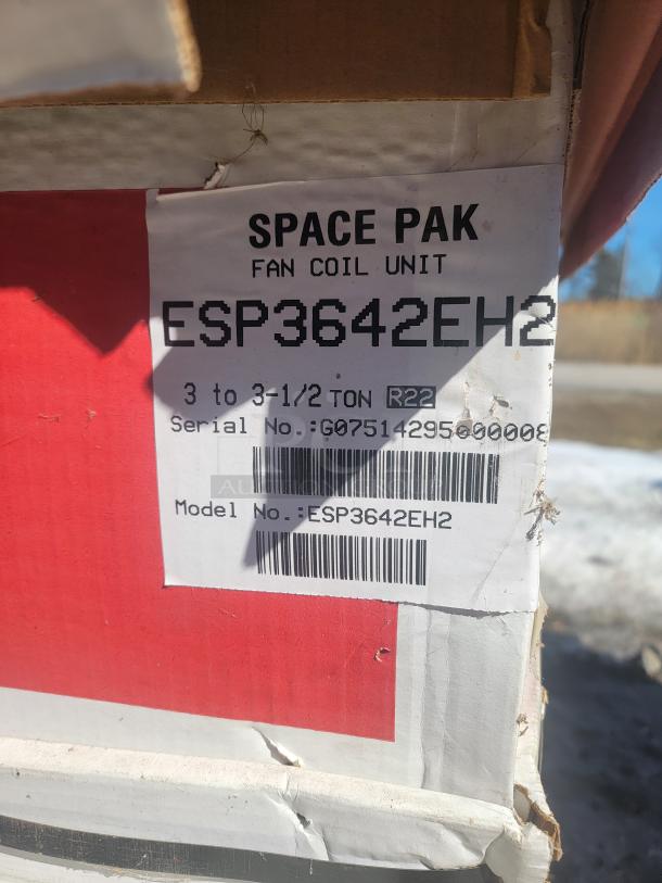 New SpacePak fan coil unit ESP3642EH2 in box. High-performance HVAC component, ideal for small duct applications.