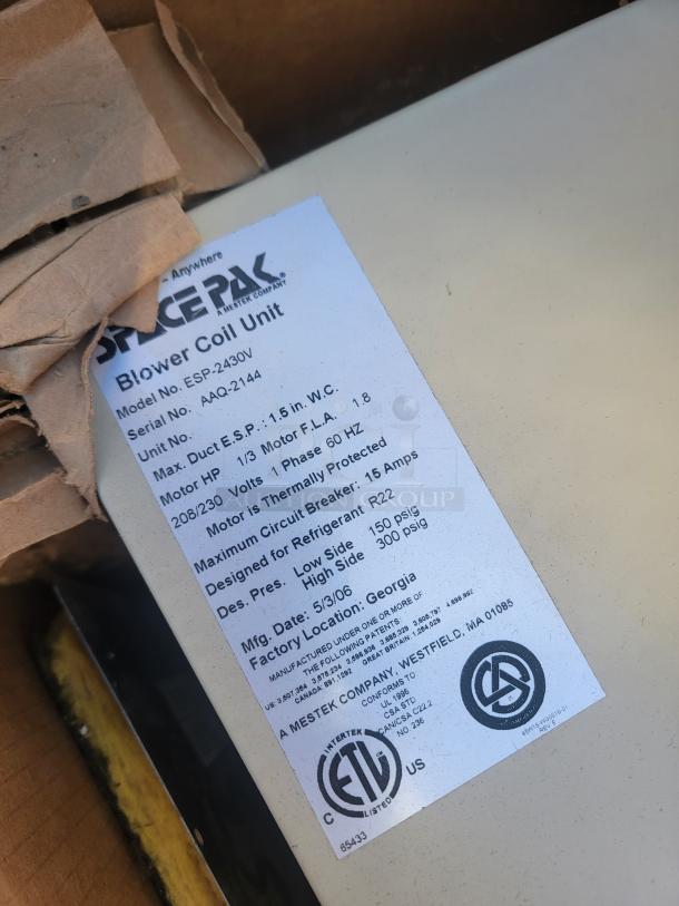 SpacePak blower coil unit, model ESP-2430V, new in box. Features high-velocity design, quiet operation, and superior humidity control.