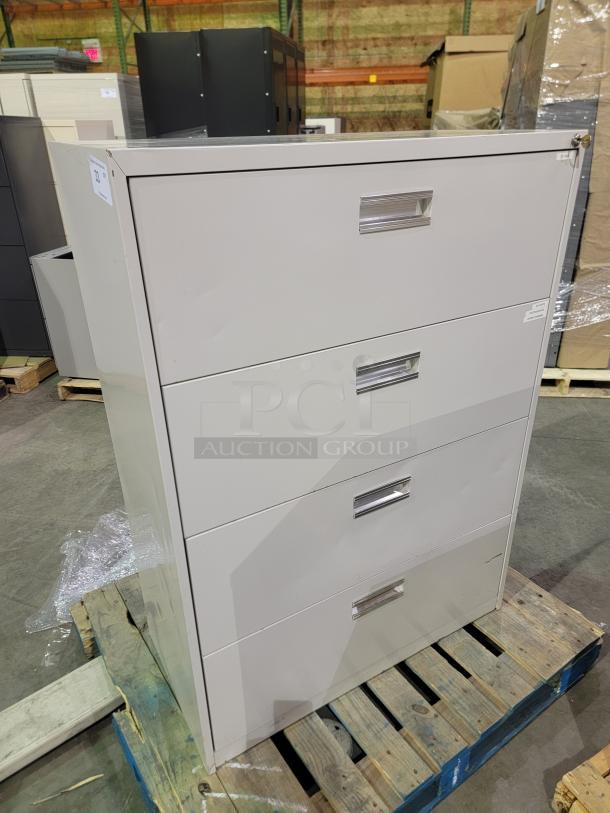 Knoll Calibre 5-drawer lateral file cabinet in neutral tone, with recessed pulls, on a pallet. Ideal for high-capacity storage.