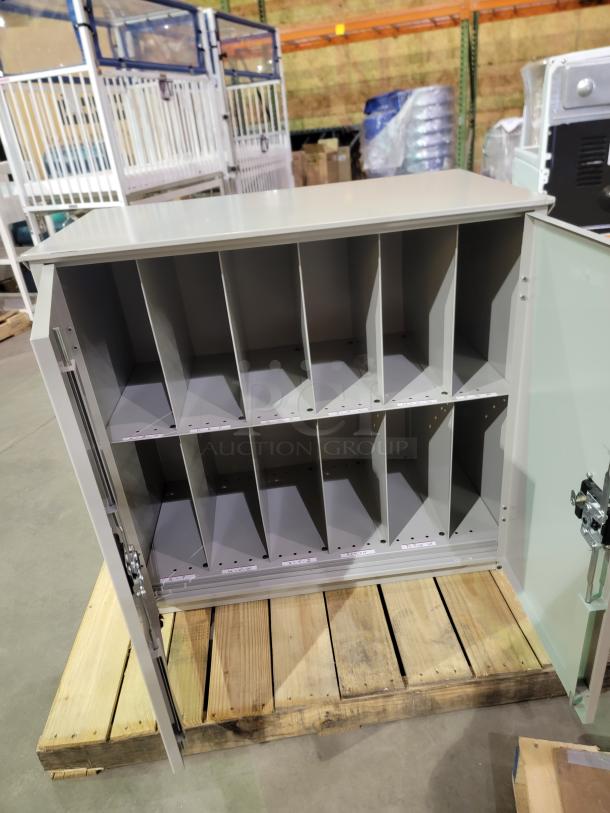 Cooper-Atkins Temp-Trak MTM500 cabinet, heavy-duty steel with 12 vertical cubbies, dual doors, and recessed latches.