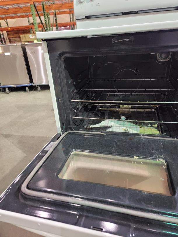 Maytag MER5751BAW electric range with open oven door, spacious interior, and multiple rack positions in clean condition.