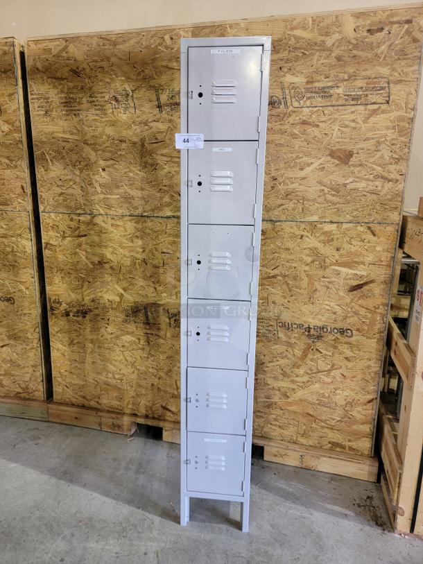 Lyon 6-Tier steel locker tower with louvers, powder-coated gray finish, and raised legs for easy cleaning access.