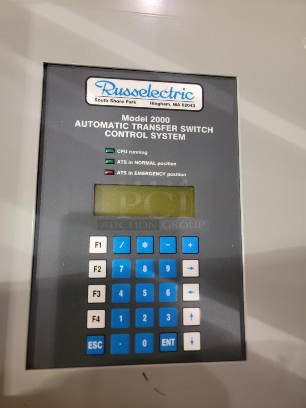 Russelectric Model 2000 Automatic Transfer Switch control panel with keypad, brand label, and status indicators.