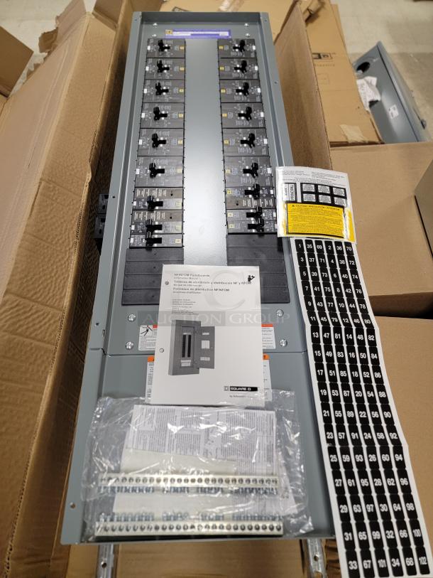 Square D NF Series 250A panelboard with E-Frame breakers, 3-phase, 4-wire. Includes labels, manuals, and safety warnings.