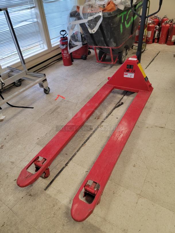 Dayton 39U68 hand hydraulic pallet truck with 6-foot forks, 4400 lb capacity, reinforced steel, visible safety and model labels.