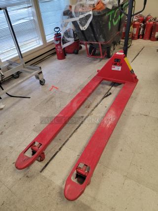 Dayton 39U68 hand hydraulic pallet truck with 6-foot forks, 4400 lb capacity, reinforced steel, visible safety and model labels.