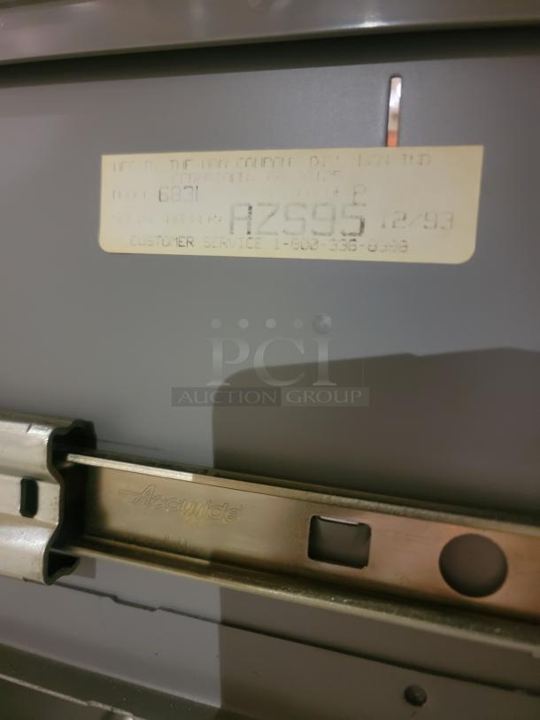 HON 683L lateral filing cabinet with steel frame, black finish, and Accuride slides. Tag shows model 683L, serial AZ595, dated 12/93.