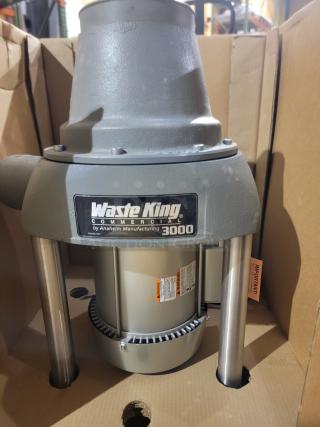 Brand-new Waste King Commercial 3000-3 garbage disposer in box, featuring a 3 HP Emerson motor; high-torque, thermally protected.