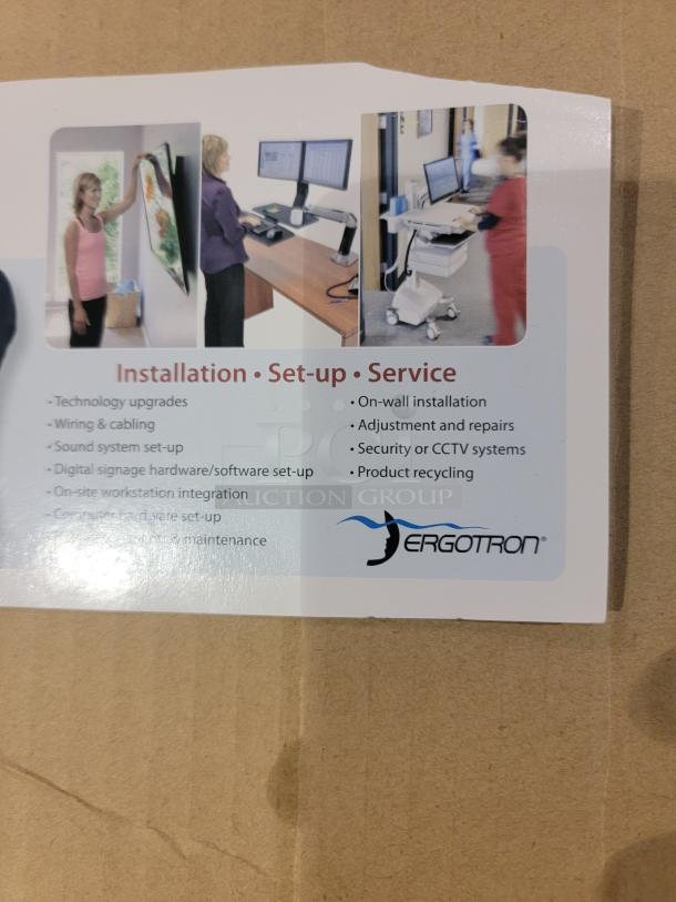 "Ergotron WorkFit-S setup guide featuring installation, service options, and Ergotron logo on a cardboard background."