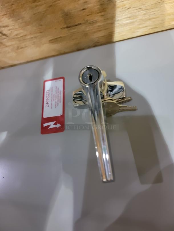 *NEW* Russelectric Model 2000 Automatic Transfer Switch showing a chrome handle and keys with a red warning label.