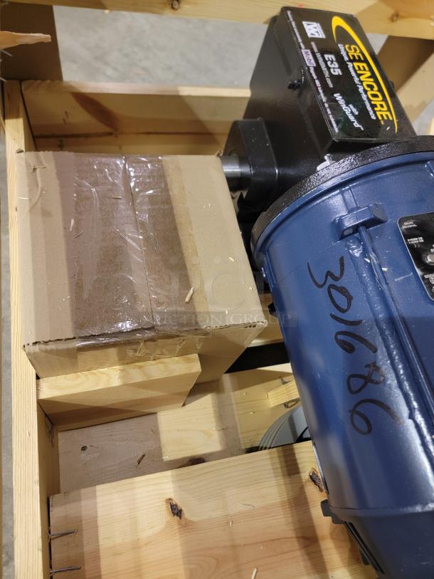 Winsmith SE Encore E35 speed reducer with Marathon Globetrotter motor in crate, WinGuard coating, labeled for shipping.