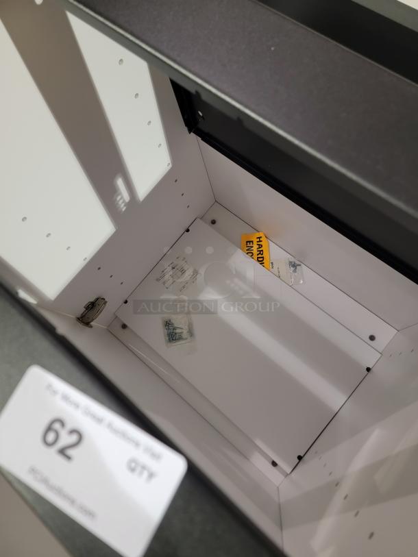 Knoll Reff Profiles white cabinet interior with hardware packet, assembly instructions, and visible European hinges.