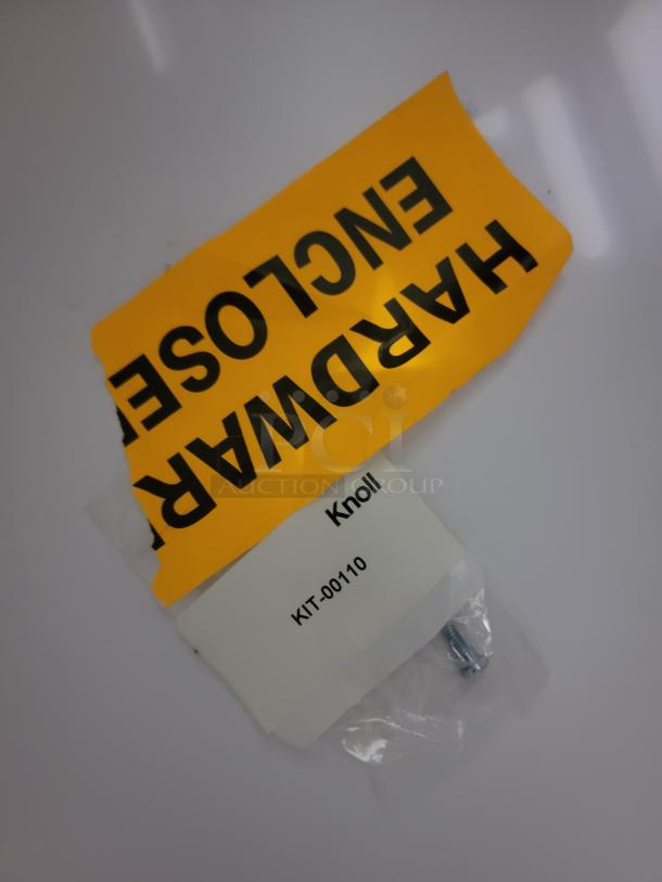 "Hardware enclosure components for Knoll Reff Profiles set, including marked bag with 'Knoll KIT-00110' label and screw."