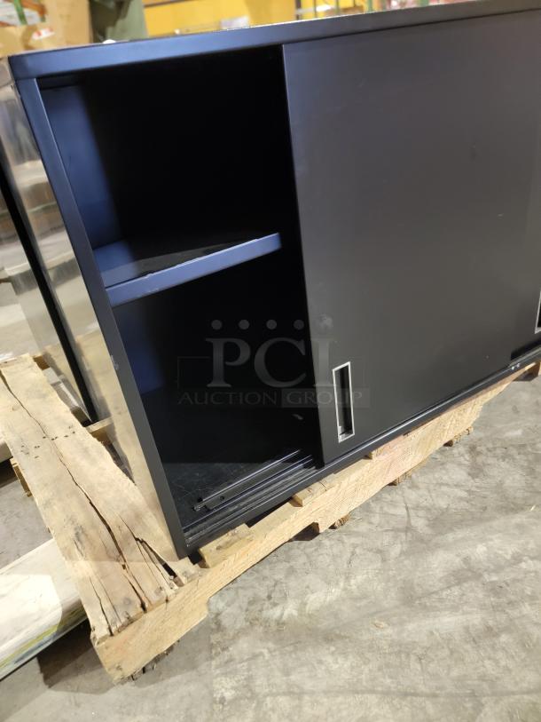 Lot of 2 Knoll Calibre sliding door cabinets in matte black, steel construction, integrated recessed pulls, excellent condition.